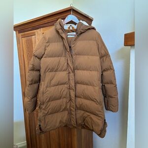 REI barely-used thigh-length down jacket with shearling hood.